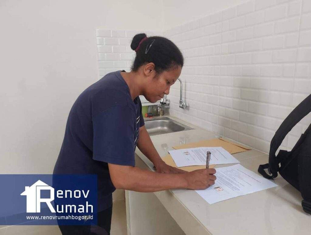 tanda tangan kontrak pekerjaan renovasi